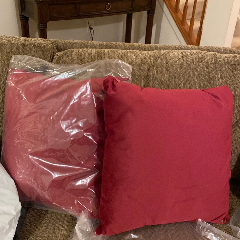 Brand new fuchsia throw pillows.